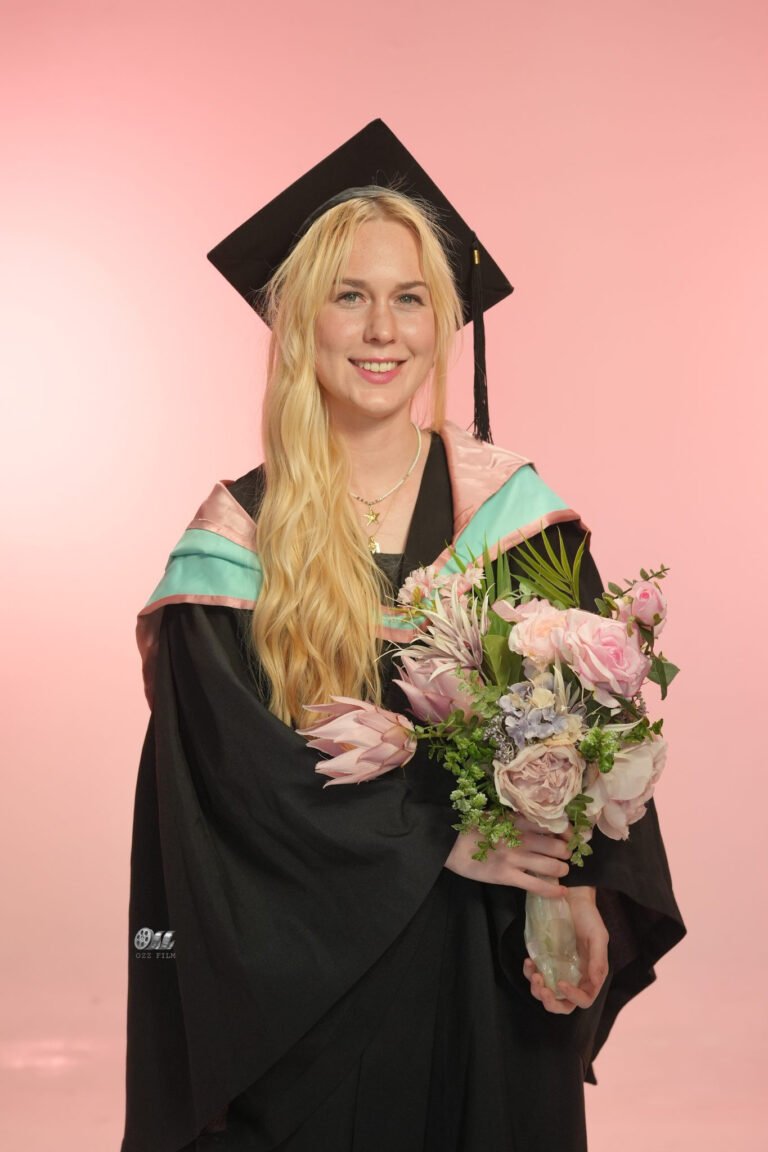 Monash University Master’s Arts graduation gown and hood