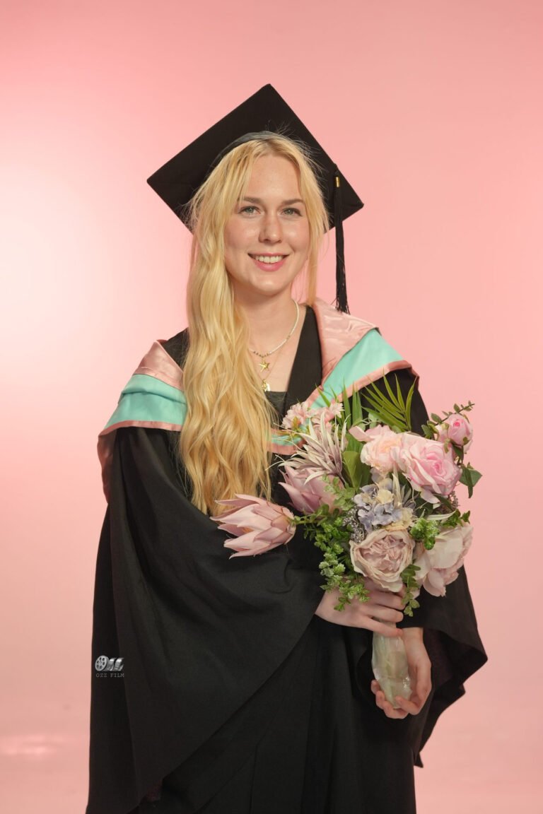 Monash University Master’s Arts graduation gown and hood