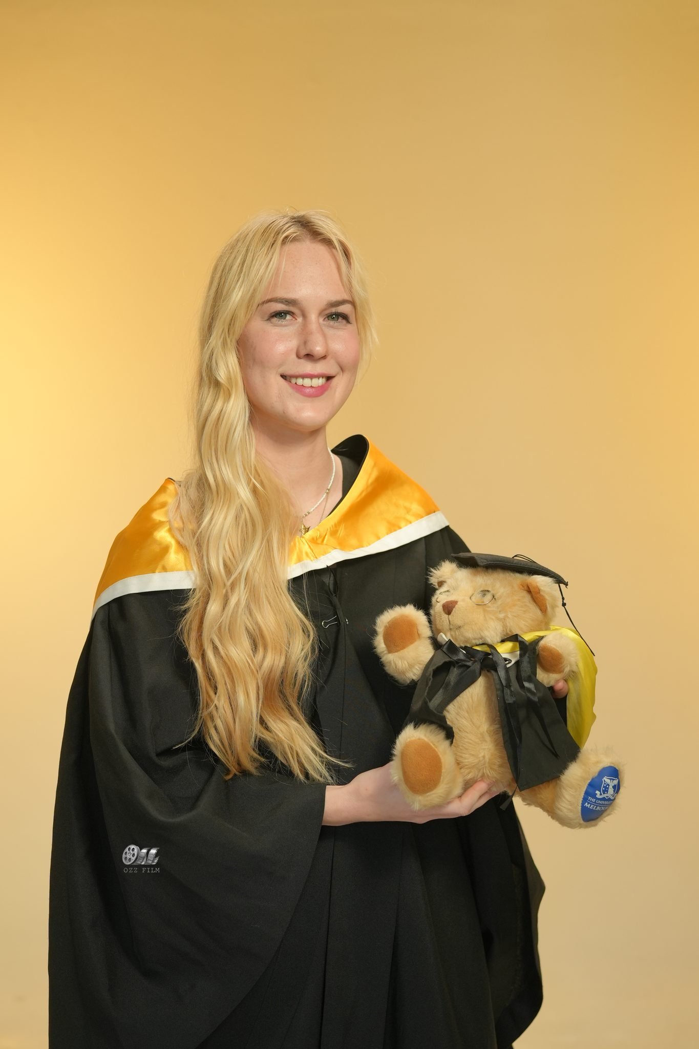 University of Melbourne Bachelor of Engineering and IT graduation gown with teddy