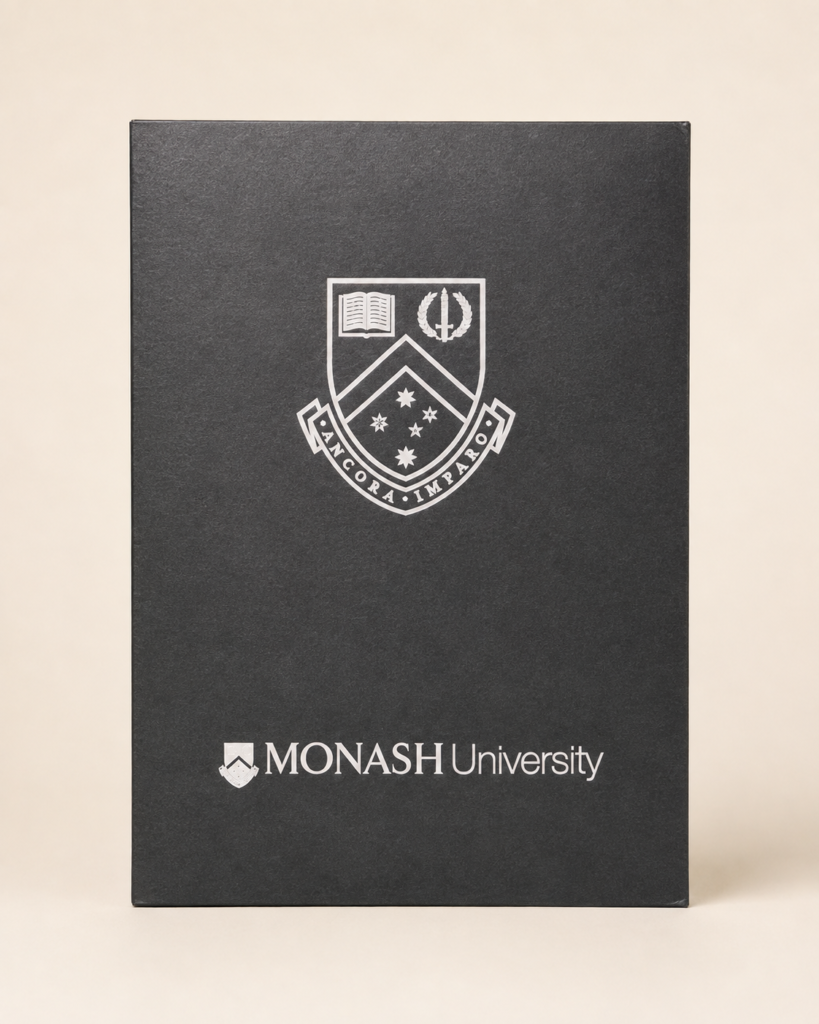 Monash University graduation certificate folder prop