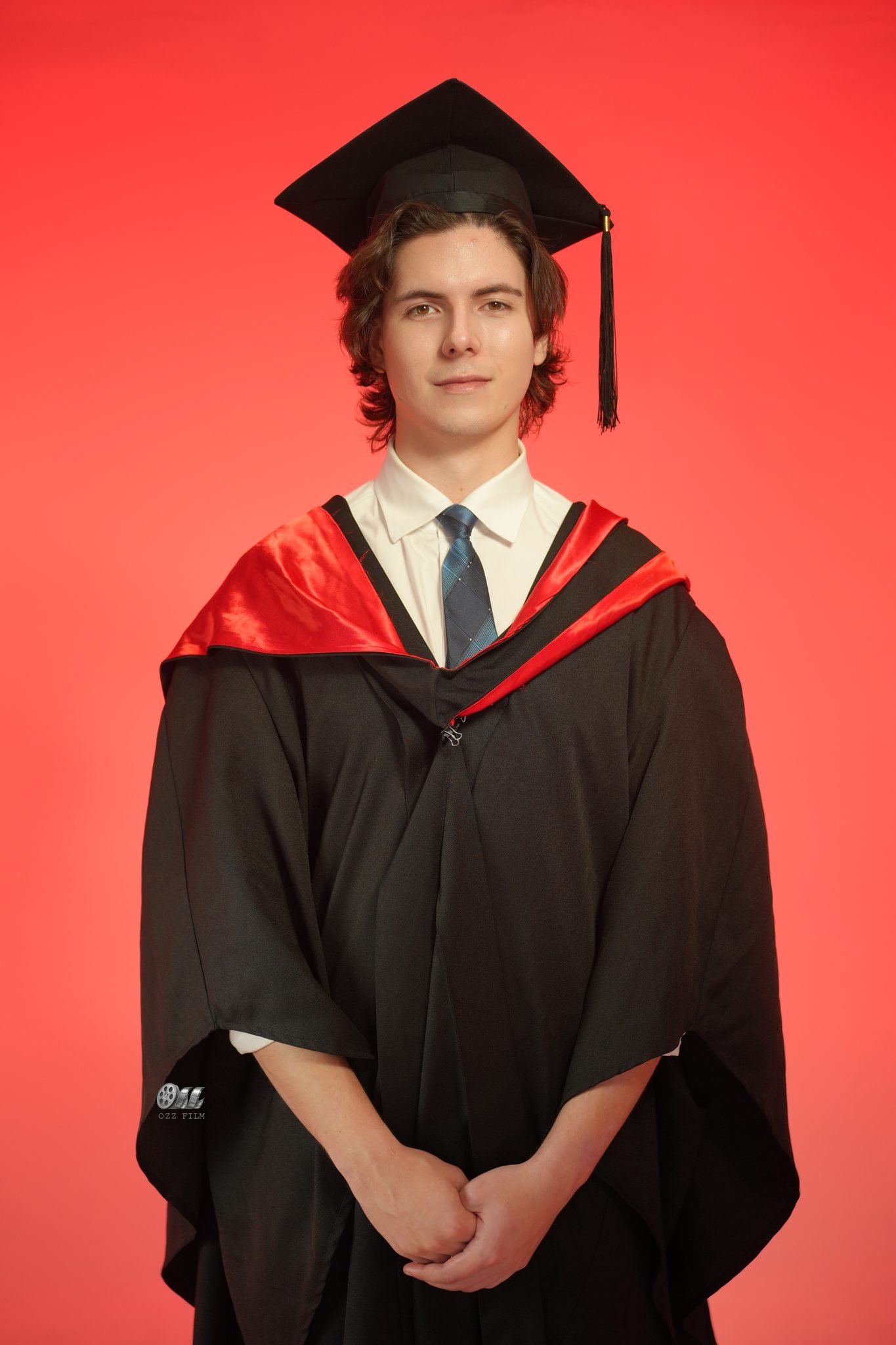 La Trobe University Bachelor’s Health Sciences graduation gown and hood