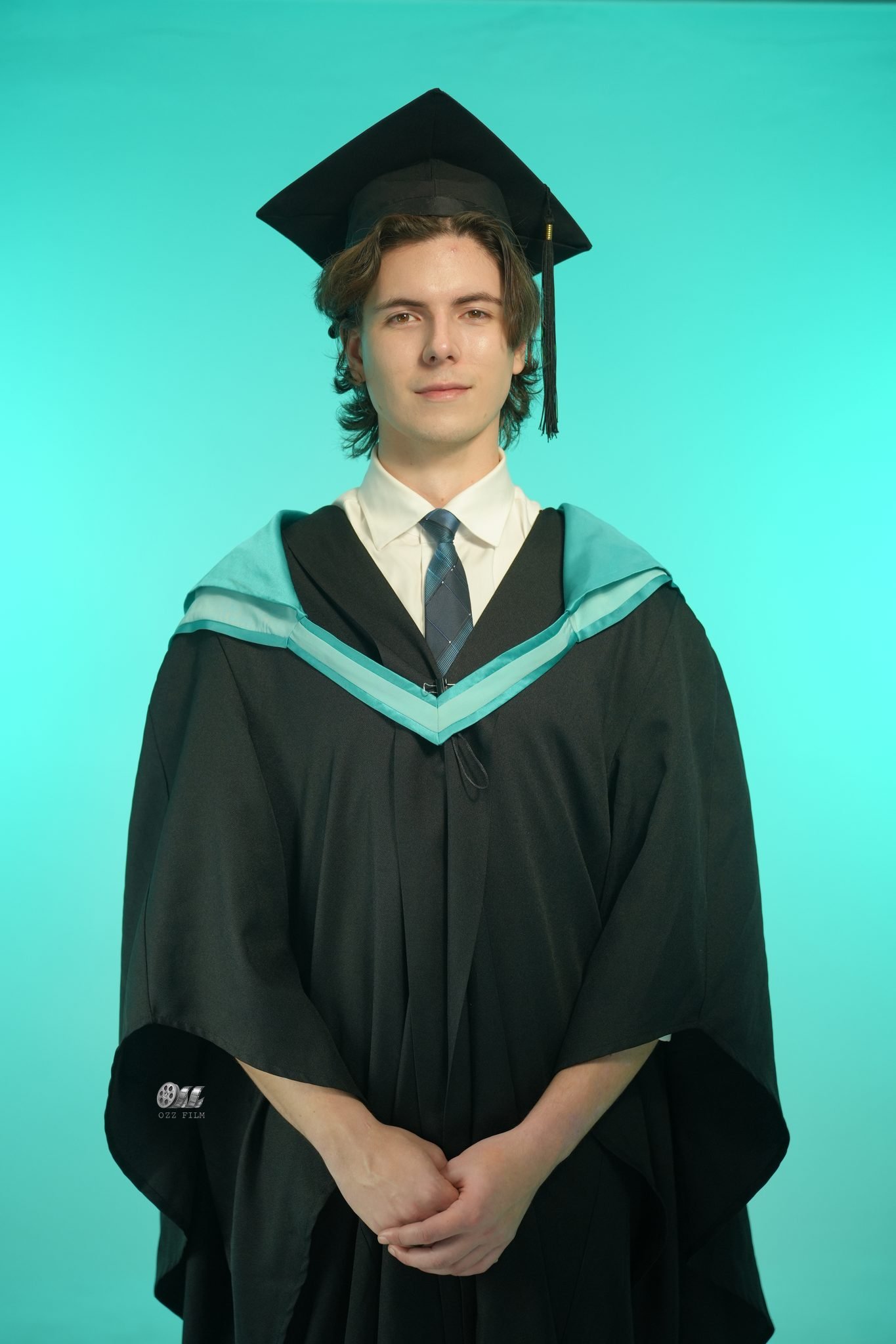 Monash University Bachelor’s Business & Economics graduation gown and hood