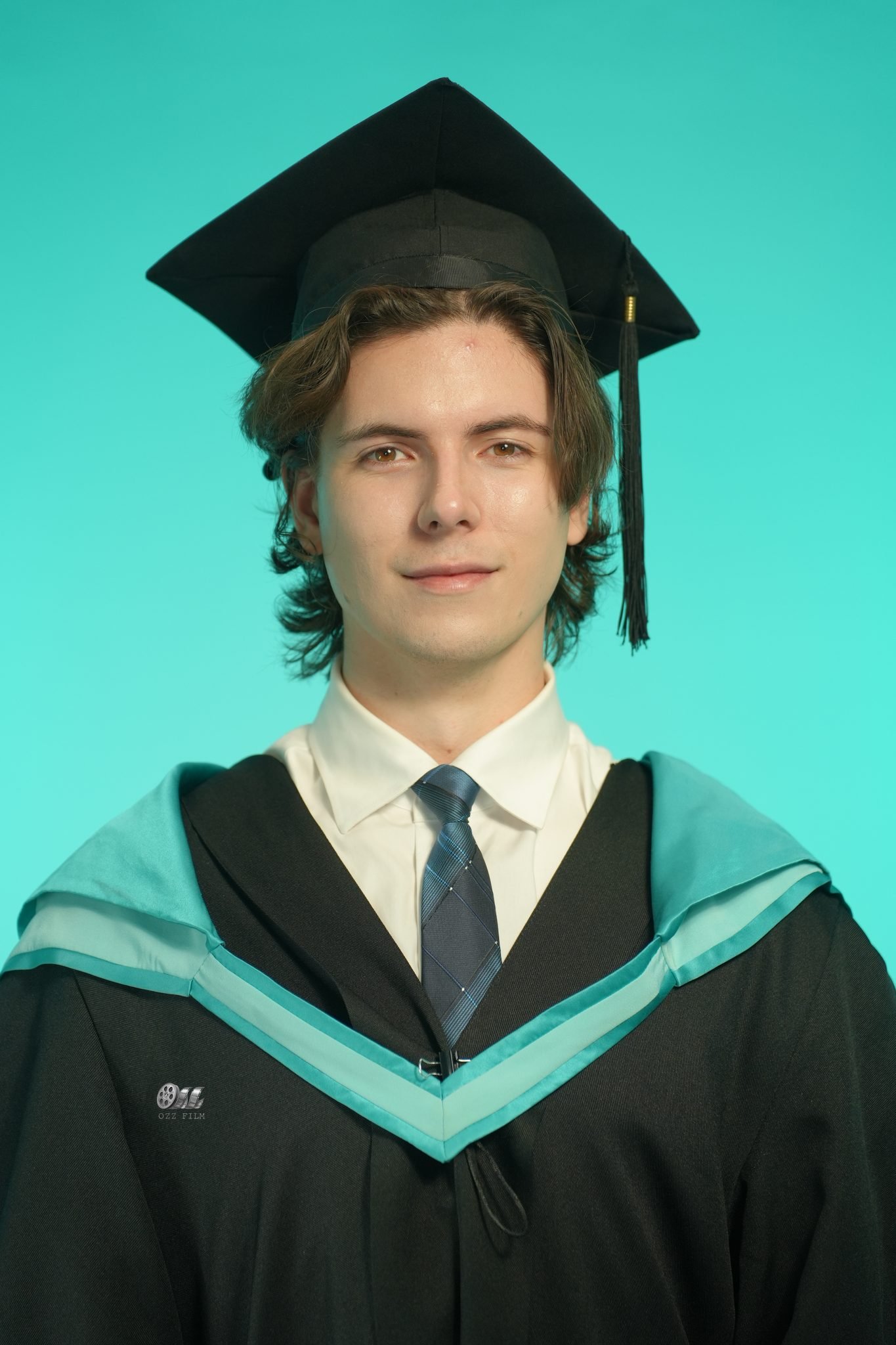 Monash University Bachelor’s Business & Economics graduation gown and hood