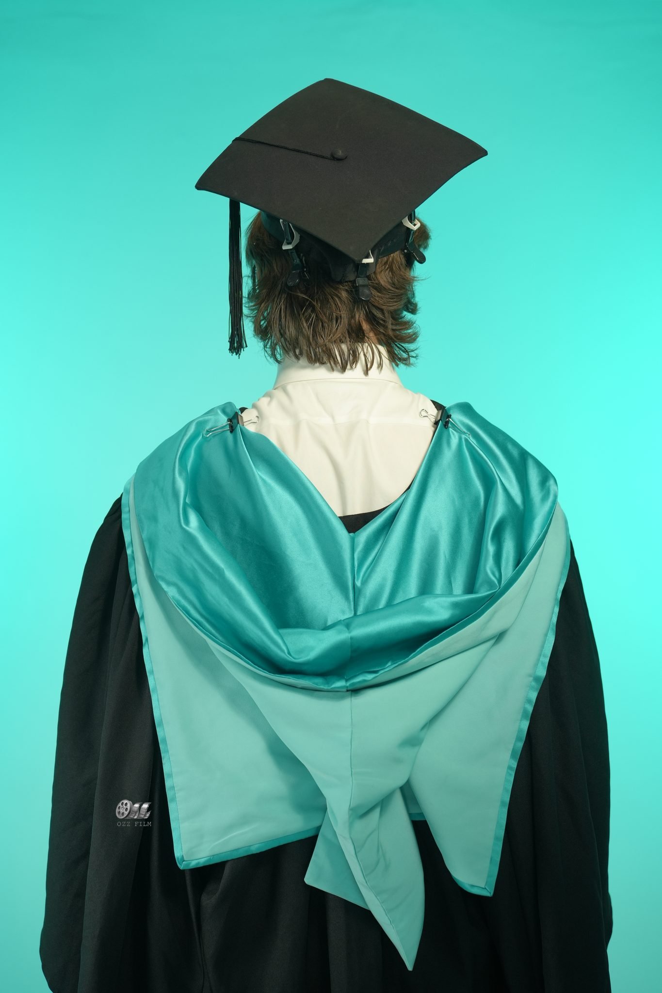 Monash University Bachelor’s Business & Economics graduation gown and hood