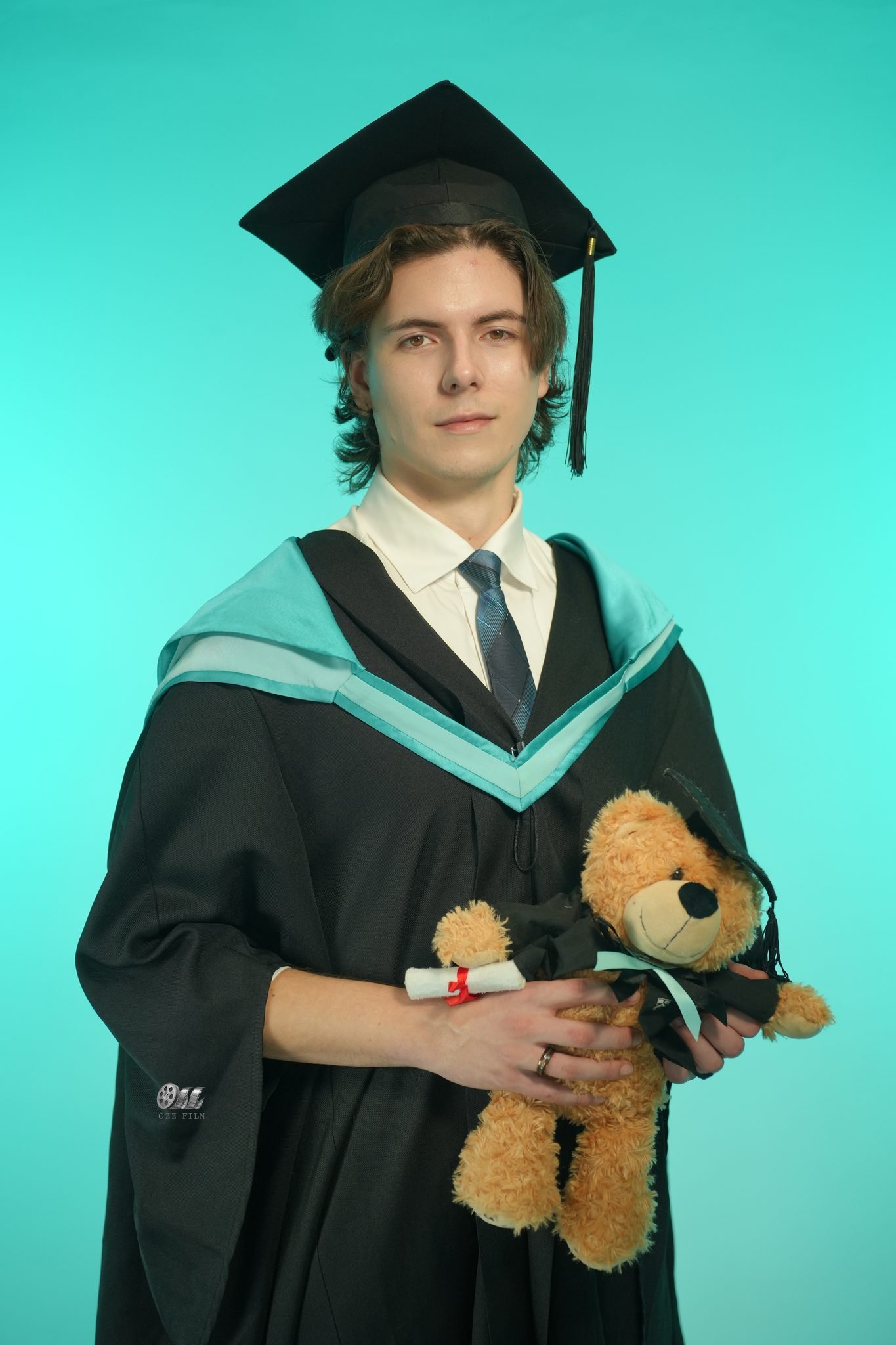 Monash University Bachelor’s Business & Economics graduation gown and hood