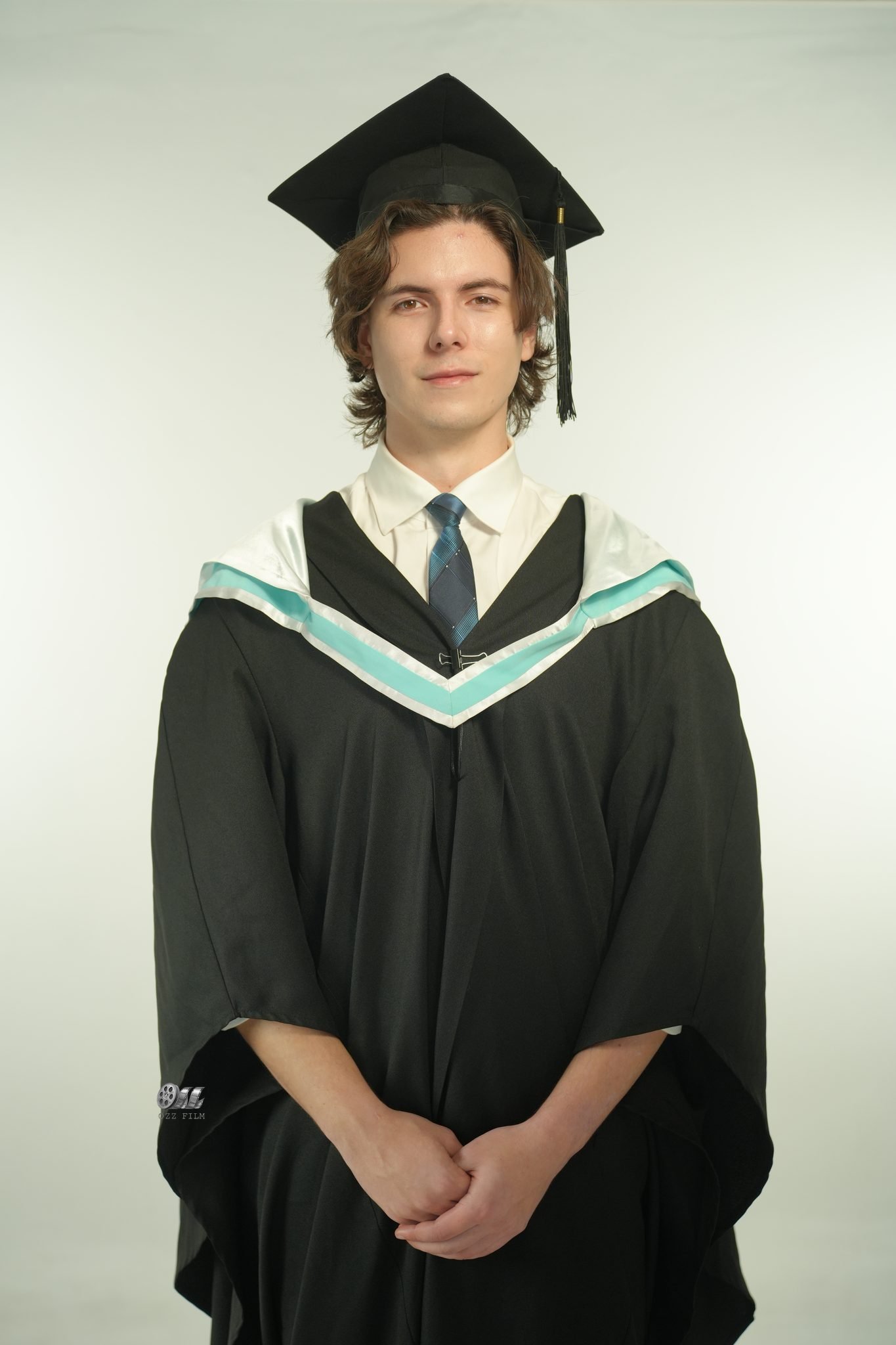 Monash University Bachelor’s Law graduation gown and hood
