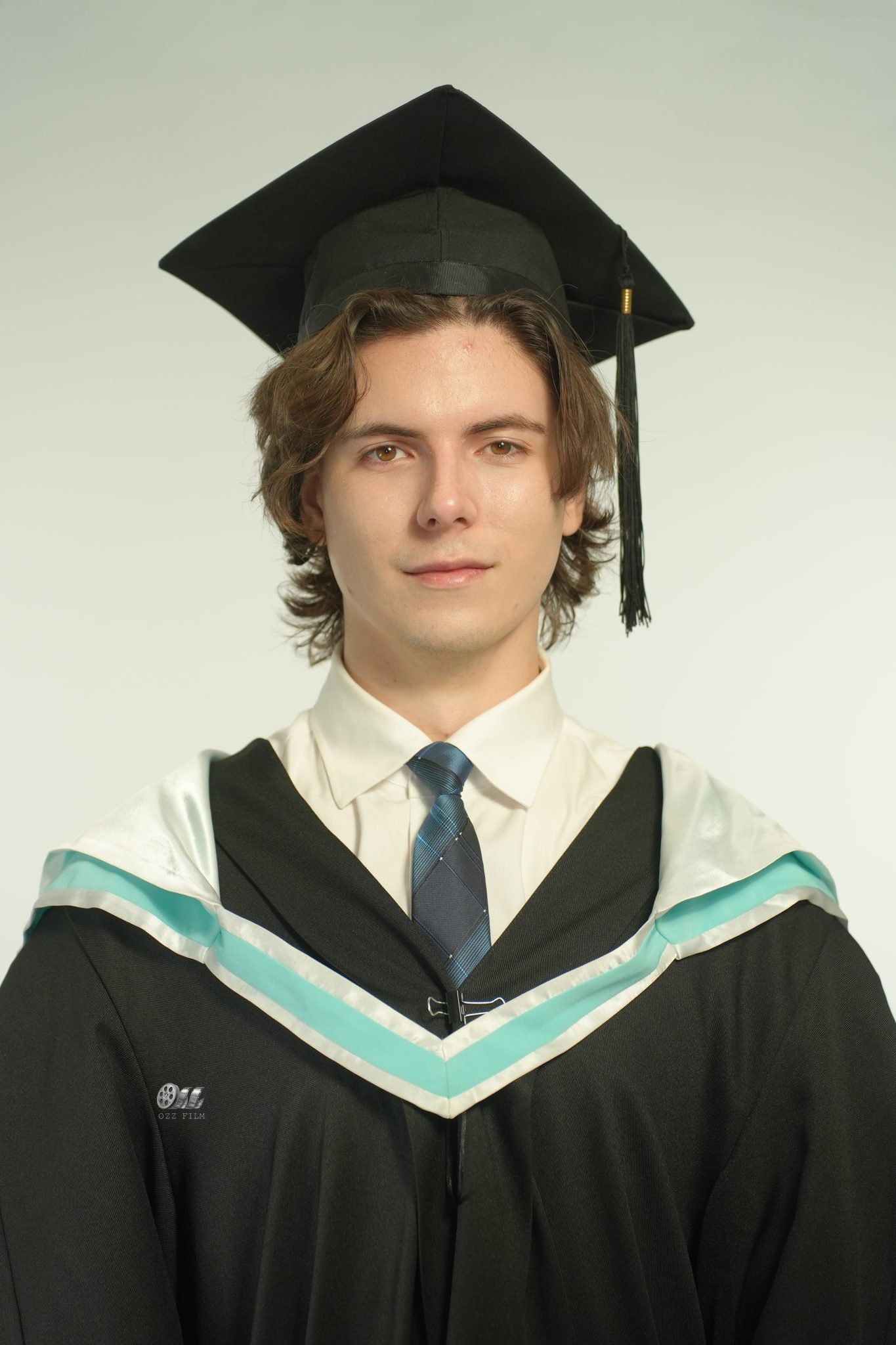 Monash University Bachelor’s Law graduation gown and hood