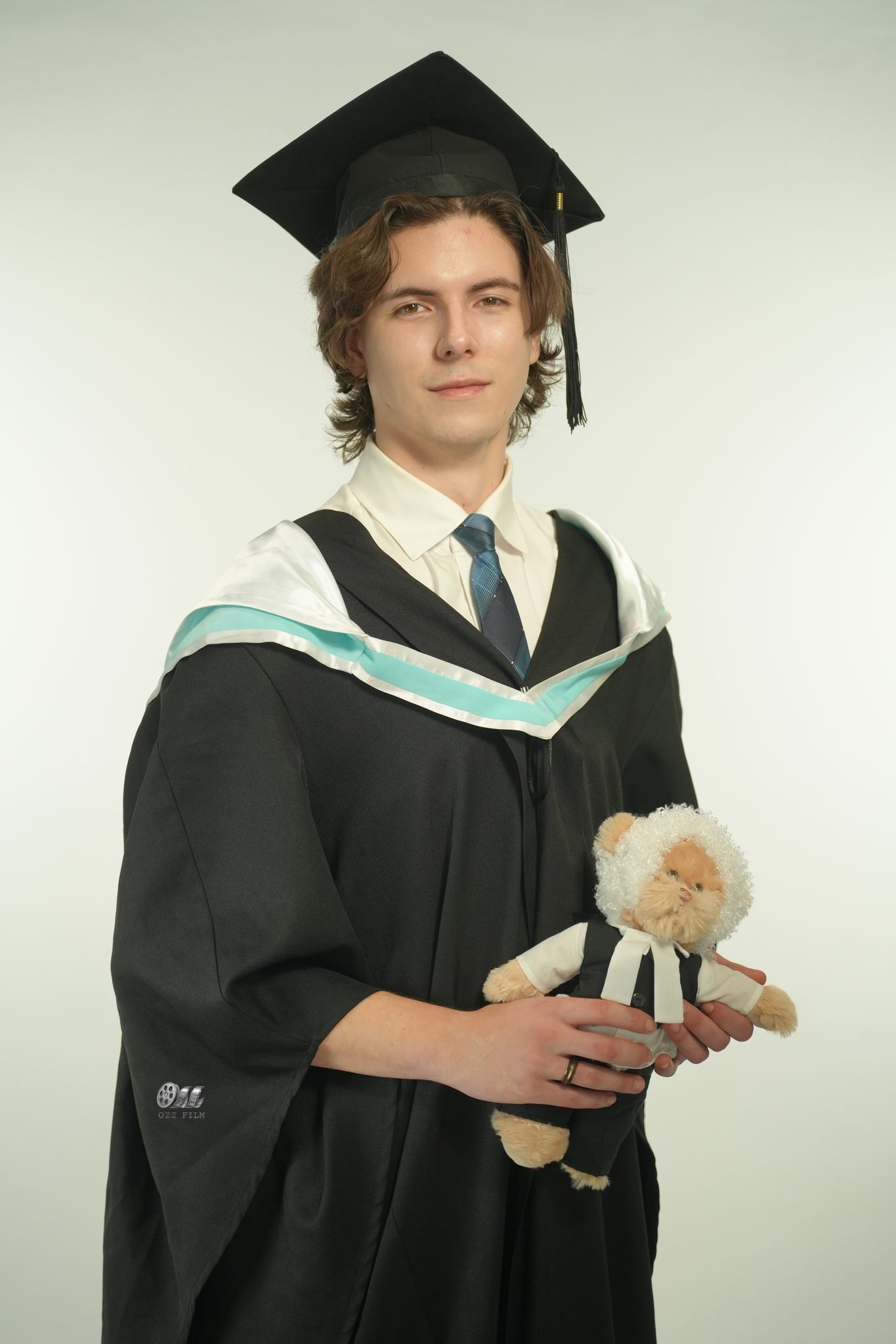 Monash University Bachelor’s Law graduation gown and hood